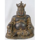 A Chinese Ming dynasty style, gilt and bronze figurine of a seated,laughing and crowned Buddha; 31.