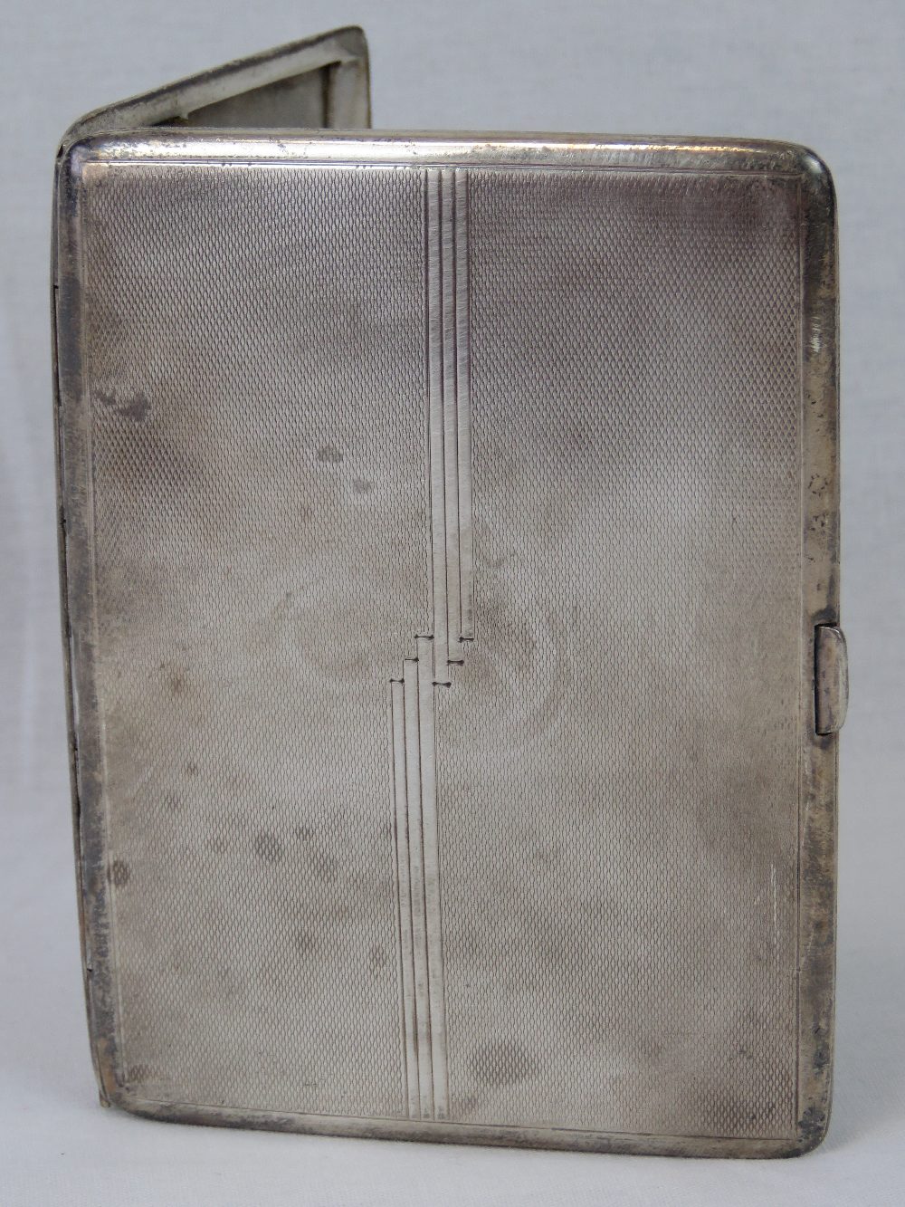 A HM silver cigarette case, Birmingham 1944 Charles S Green & Co, 10.8 x 9cm, 6.