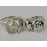 Two silver rings; an equestrian style ring with horse head and shoe design, size S-T,