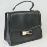 Kate Spade; a ladies black leather handbag having single loop handle, shoulder strap,