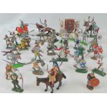 A collection of vintage Britains plastic figures of Knights together with some similar style