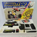 A Formula Tyco 'Nigel Mansell World Champion' 60ft (18.3m) racing car set in original box.