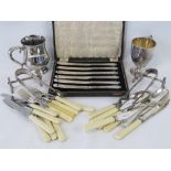 A cased set of six butter knives together a late 19th century plated Christening cup and other