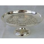 A HM silver tazza with repoussé fruit design, Birmingham 1899, 9cm tall, 20.5cm dia, 9.32ozt.