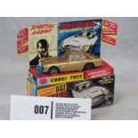 An original 007 James Bond DB5 No261 in gold complete with spare 'baddie',