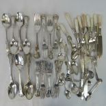 A quantity of silver plated cutlery including; serving spoons, table spoons, teaspoons, forks,