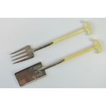 A set of Late 19th century, novelty, spade and fork sardine servers,