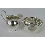 A HM silver cream jug, London 1902, and a sugar bowl, Birmingham 1915, engraved 'Daphne 10 Dec 17',