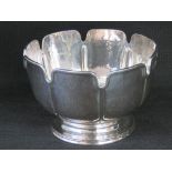 A Britannia standard HM silver Arts and Crafts single footed bowl with planished finish,