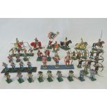 A collection of lead model medical archers and crossbowman and some mounted cavalry together with