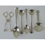 A quantity of HM silver; a Victorian caddy spoon - Birmingham 1868 - George Unite,