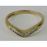 A 9ct gold and diamond wishbone style ring, hallmarked 375, size N, 1.