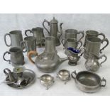 A collection of vintage and 19th century pewter wares including various tankards and other pieces;