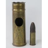 A WWI trench art shell case having floral embossed design and bearing name 'Dixmude' - the Belgian