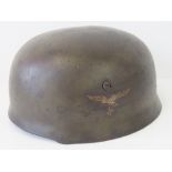 A WWII German 'Fallschirmjäger' Paratroopers helmet, single luftwaffe decal, with leather liner.