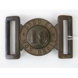 A Victorian brass regimental clasp belt buckle bearing 'Dieu et Mon Diort' and the No 19 upon,