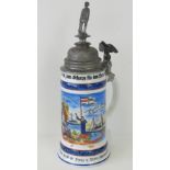 An original early 20th century hand painted ceramic German military stein with cast and pierced lid,