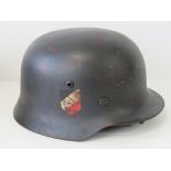 A WWII German Luftwaffe helmet with double decal and leather liner.