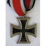 A WWII German 2nd Class Iron Cross with ribbon.