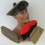 Four WWII hats, one Scottish bonnet,