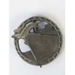 A German WWII Blockade Breakers badge, stamped verso "Richard Feix Gablonz a.d.