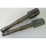 Two inert WWII German stick grenades, one with shrapnel sleeve.