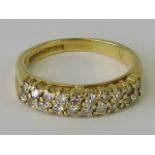 An 18ct gold and diamond double row half