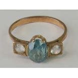 A rose metal topaz and white stone ring,