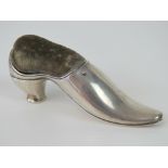 A HM silver pin cushion in the form of a Edwardian ladies slipper,