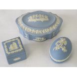 Three Wedgwood Jasperware trinket boxes: one oval (11.5cm long); another square form (4.