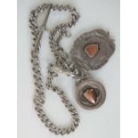 A HM silver Albert chain with dog clasp, T-bar and two HM silver fobs, total weight 1.