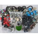 A quantity of modern costume jewellery including earrings, necklaces, bracelets etc.