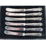 A set of six butter knives with HM silver handles, Sheffield 1932, complete with fitted box.