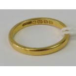 A 22ct gold ring, hallmarked 22ct, size O-P, 3.