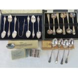 A hallmarked silver teaspoon and a HM silver napkin ring within original box, total 1.2ozt.