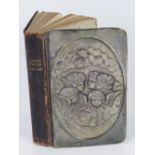 A HM silver covered copy of The Church of England Common Prayer Hymns,