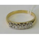 An 18ct gold and diamond ring,