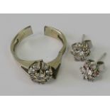 A pair of 9ct white gold and diamond cluster earrings with matching unmarked ring a/f.