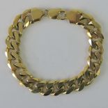 A heavy gold on silver mens curb link bracelet, stamped 925, 23cm long, 62.