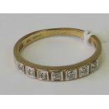 A 9ct gold and diamond half eternity ring,