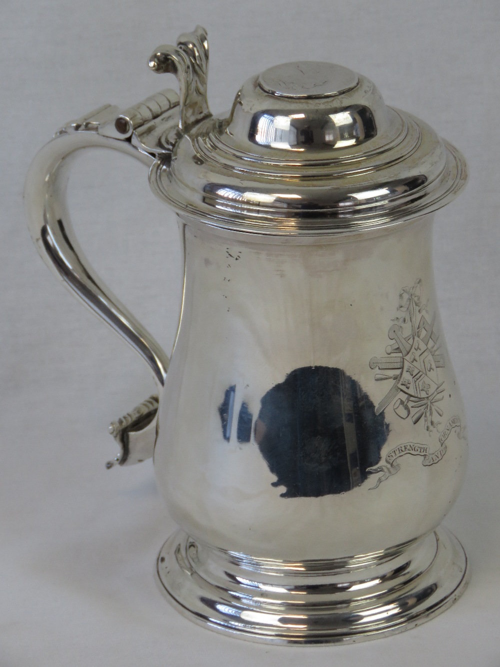 A superb George III HM silver lidded tankard dating to 1773 by Charles Wright.