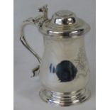A superb George III HM silver lidded tankard dating to 1773 by Charles Wright.