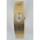 A heavily gold plated 'Castle' 17 jewel ladies manual wristwatch with integral strap.