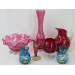 Seven vintage glass items including a cranberry handkerchief bowl,