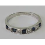 An 18ct white gold sapphire and diamond ring,