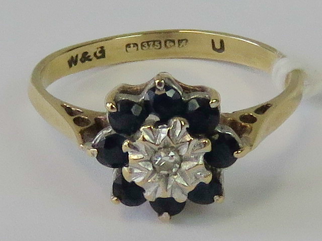 A 9ct gold sapphire and diamond ring,