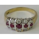 A 9ct gold ruby and white stone ring,