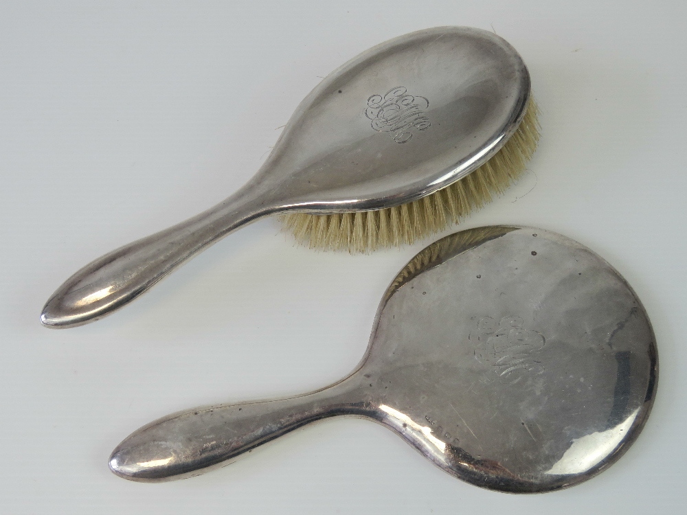 A HM silver ladies dressing table mirror and brush set, Birmingham 1919 & 21 - Broadway and Co,