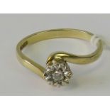 A 9ct gold diamond solitaire ring, illusion set diamond on twist style shank hallmarked 375,