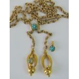 An unusual Victorian bolo style necklace set with turquoise, unmarked yellow metal,